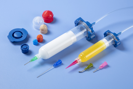 Optimum syringe barrels, tips, adapter, end caps, and pistons